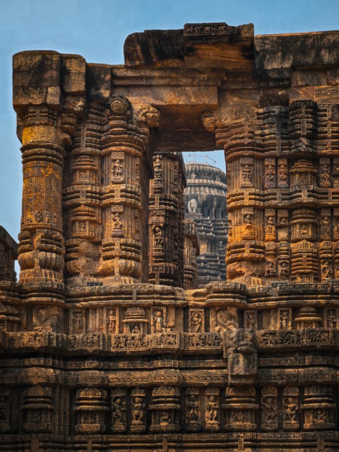 gallery-3 Detailed view of the intricate stone carvings at the historic Konark Sun Temple, Odisha, India.