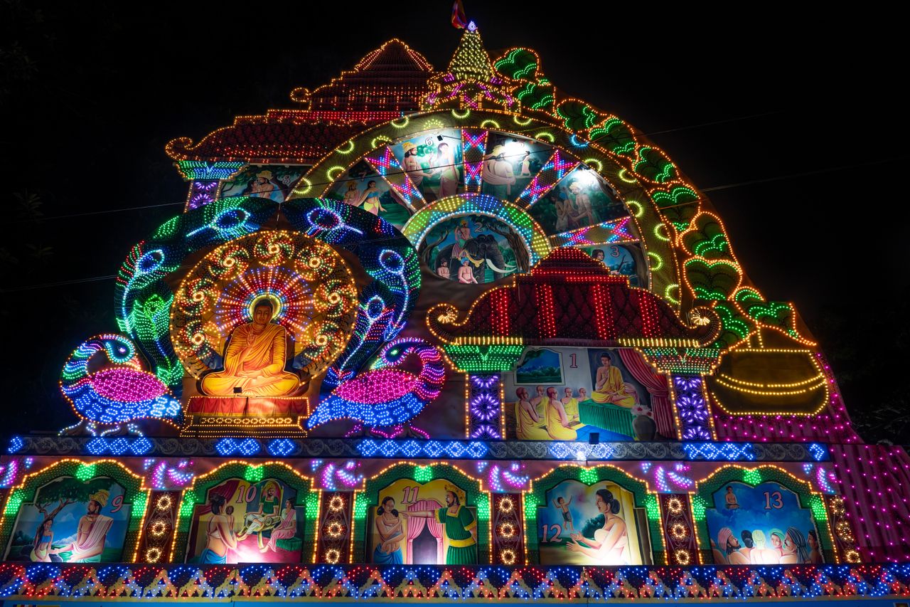 Colorful illuminated Vesak celebration showcasing Buddhist culture in Colombo, Sri Lanka.